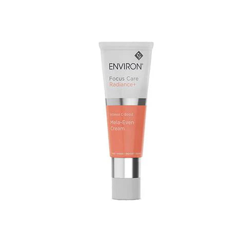 A tube of Environ Intense Boost Mela-Even Cream with orange and white packaging.