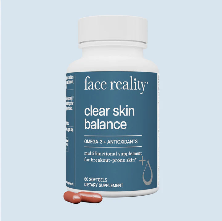 A bottle of Face Reality Clear Skin Balance supplement with a label indicating it contains Omega-3s and Antioxidants, and is formulated for breakout prone skin.